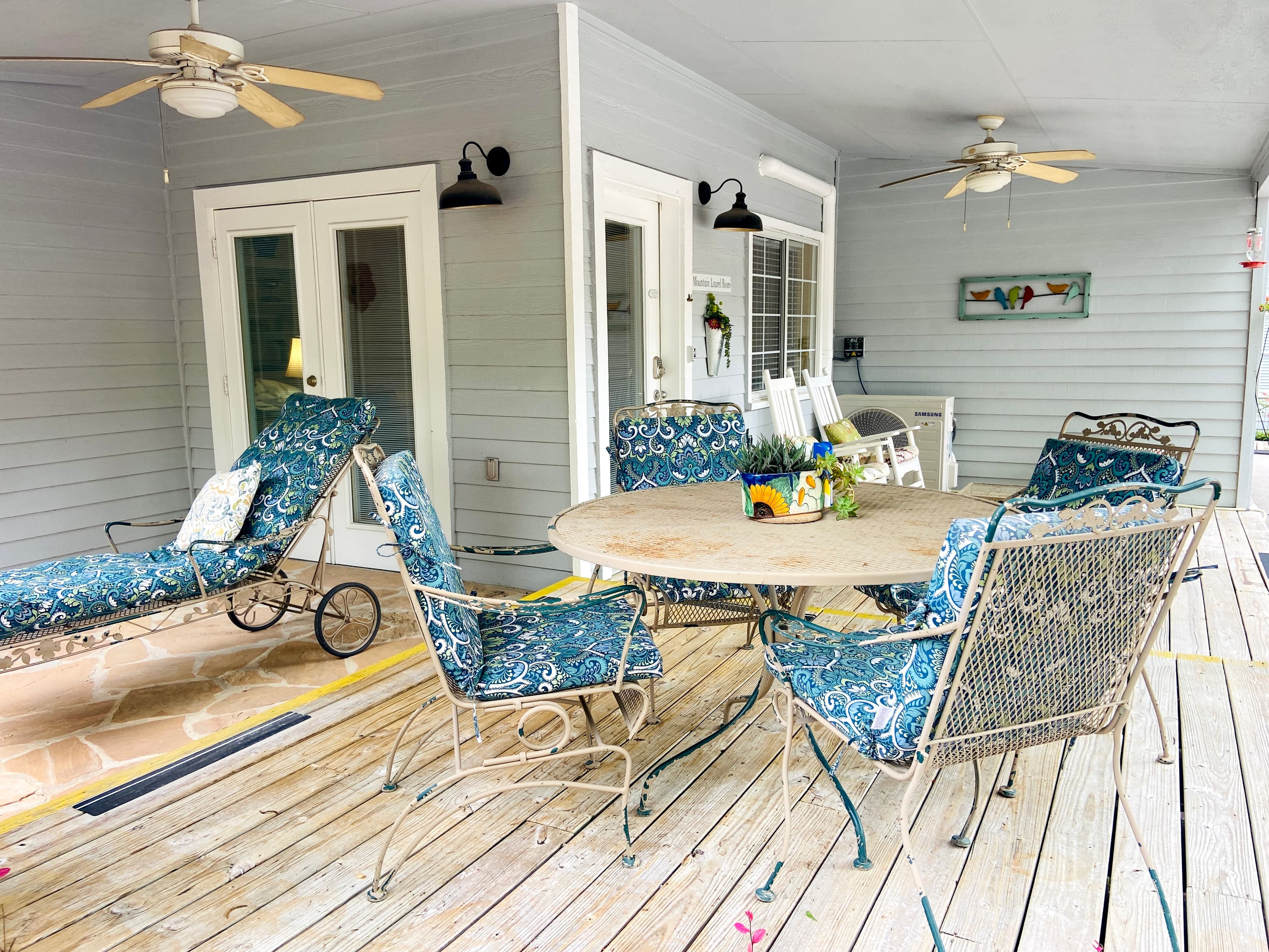 Mountain Laurel Room — Bright Studio with Wrap-Around Patio & Jetted Tub interior view 4 at Comal Inn boutique vacation rental New Braunfels TX