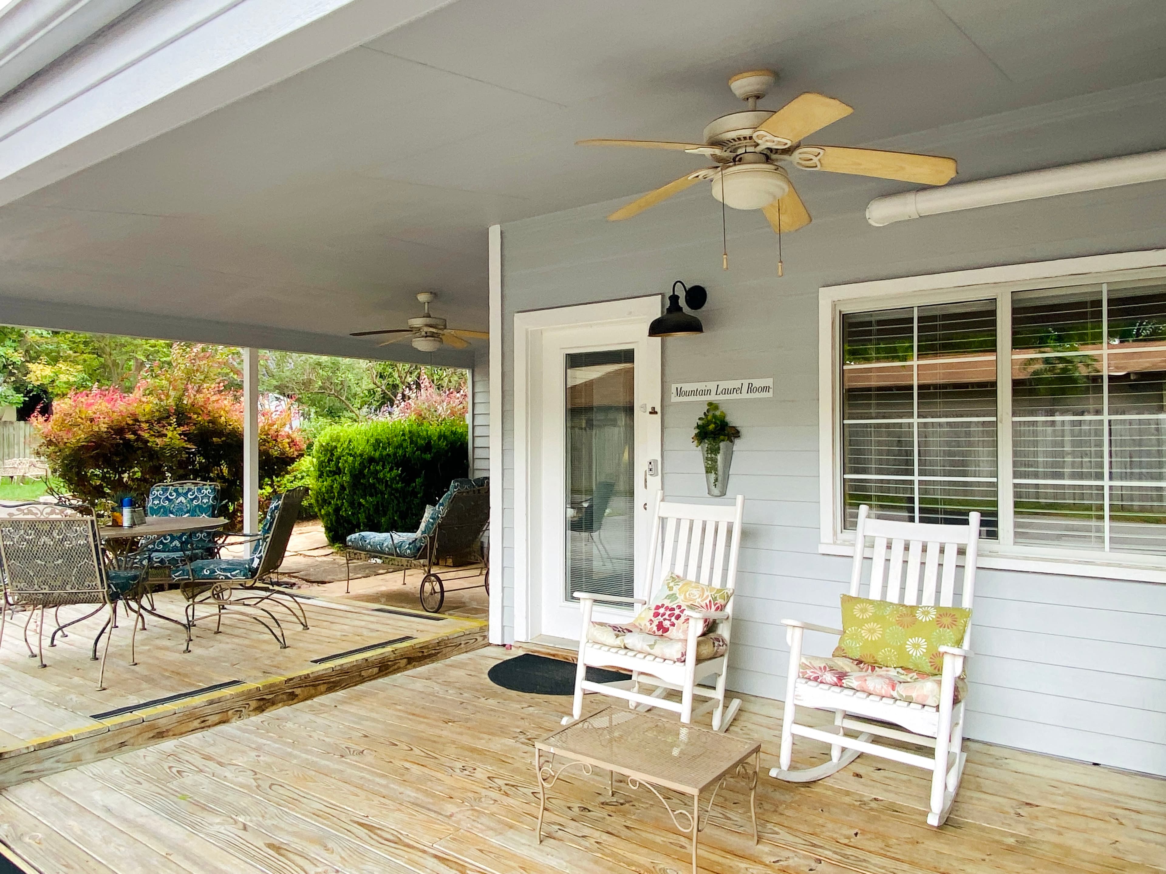 Mountain Laurel Room — Bright Studio with Wrap-Around Patio & Jetted Tub interior view 5 at Comal Inn boutique vacation rental New Braunfels TX